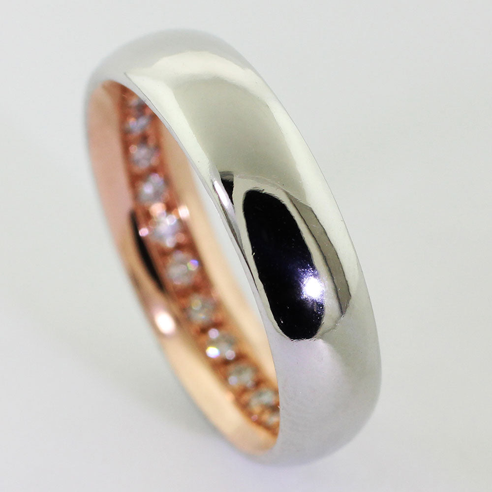 Custom platinum & 14kr inside eternity band epitomizes timeless beauty and eternal commitment. 26 1.8 vs-gh diamonds encircle the inner circumference of the band.