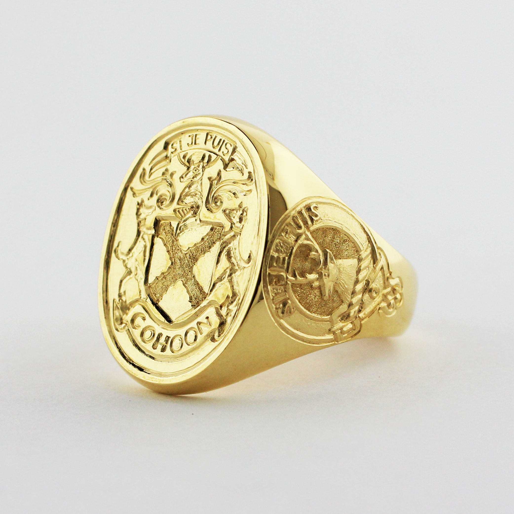 Custom 18ky signet ring with engraved family crest.