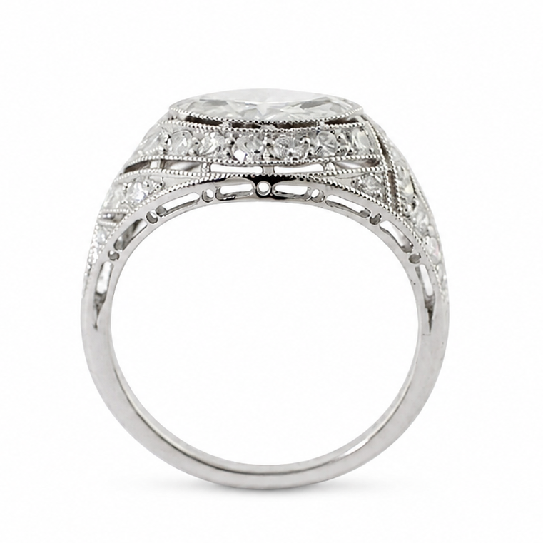 Ava Jane Art Deco platinum ring featuring a 1.13 ct east-west marquise diamond in an illusion bezel setting with accent diamonds and hand-applied milgrain detail