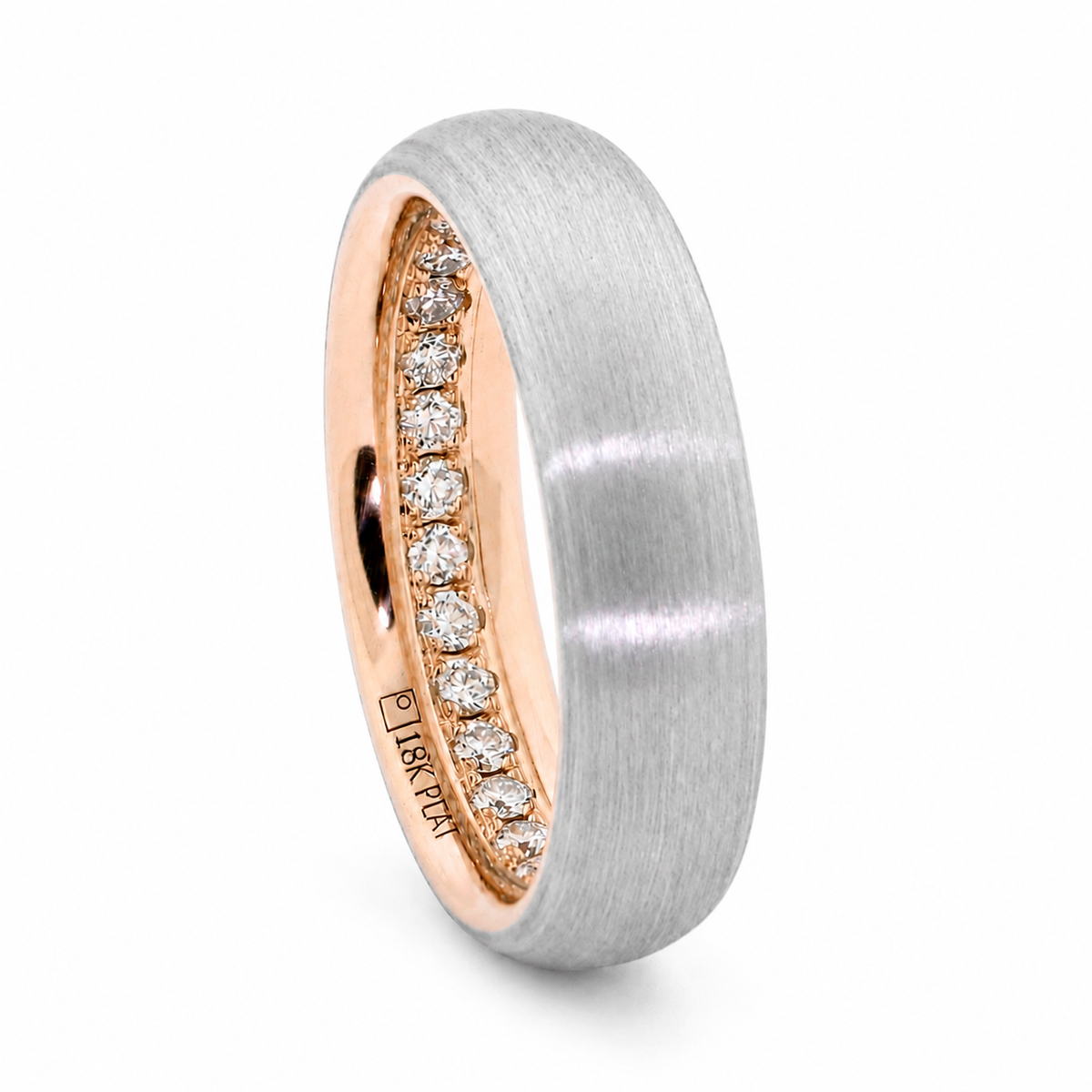 Two-tone Ott Band with Palladium 500 outer sleeve, 14k rose gold inner sleeve, and hidden full eternity diamonds inside the ring.