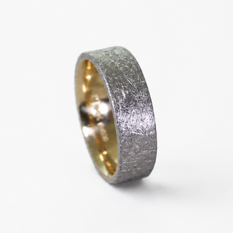 Duke two-tone band with Palladium 500 rustic exterior, 14k rose or yellow gold inner sleeve, and polished comfort fit interior.