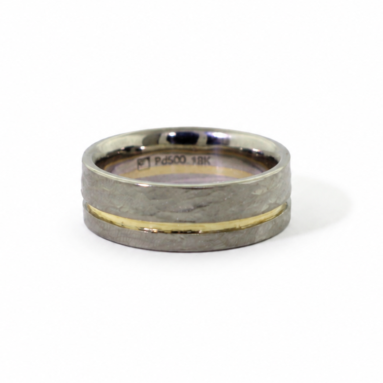 Mize Band in Palladium 500 with an off-center yellow gold stripe, hammered rustic texture, and comfort fit interior.